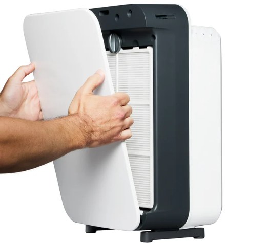 Opening the front panel of the Alen BreatheSmart 35i to change the filter
